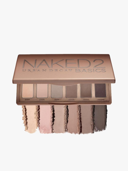 The Urban Decay Naked 2 Basics Eye Shadow Palette on a light gray background