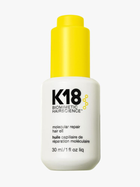 K18 Molecular Repair Hair Oil in branded component on a light gray background